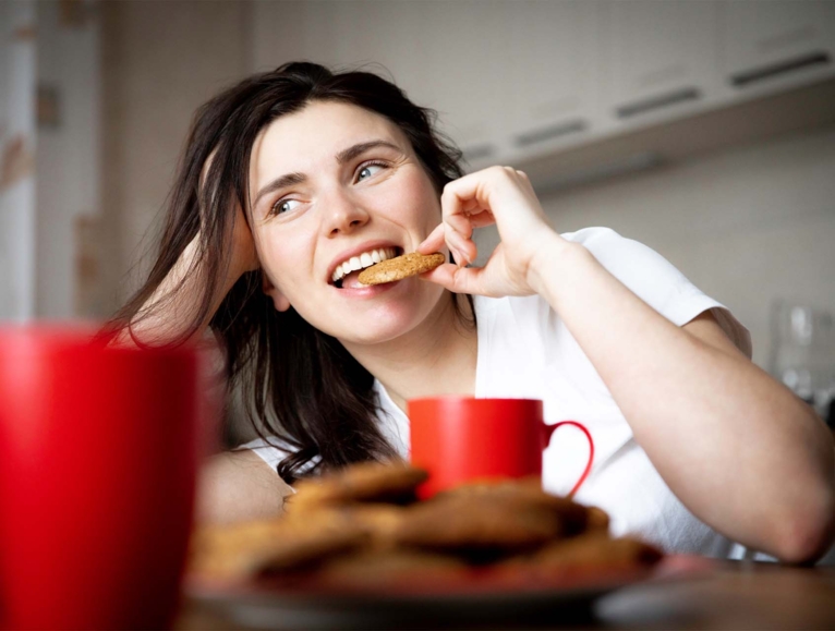 woman eating a cookie